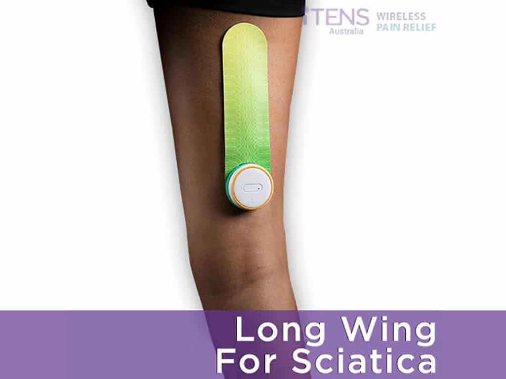 A person wearing a long wing iTENS electrode for sciatica
