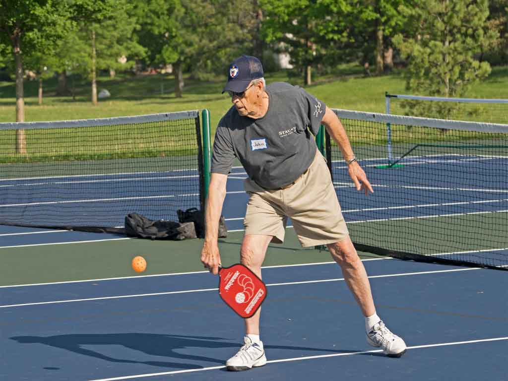 An elderly man enjoying sports