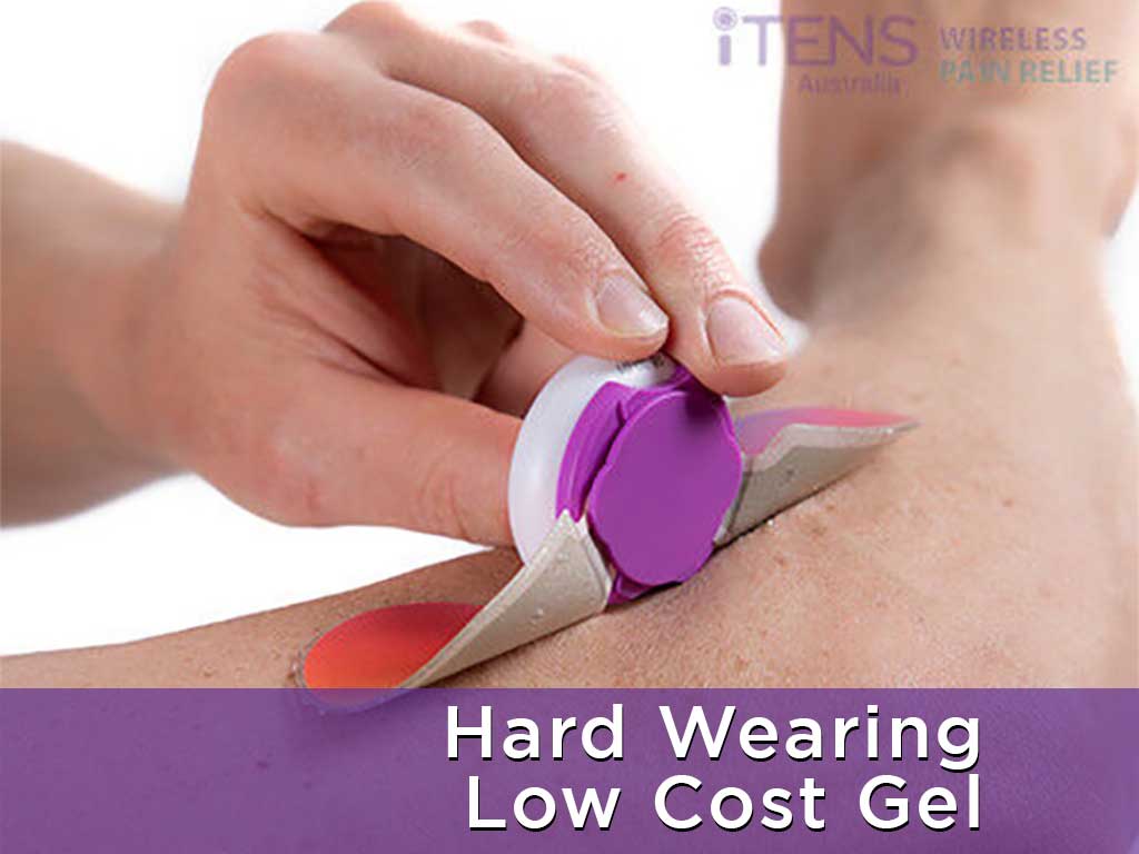 A wireless TENS machine being put on the skin.