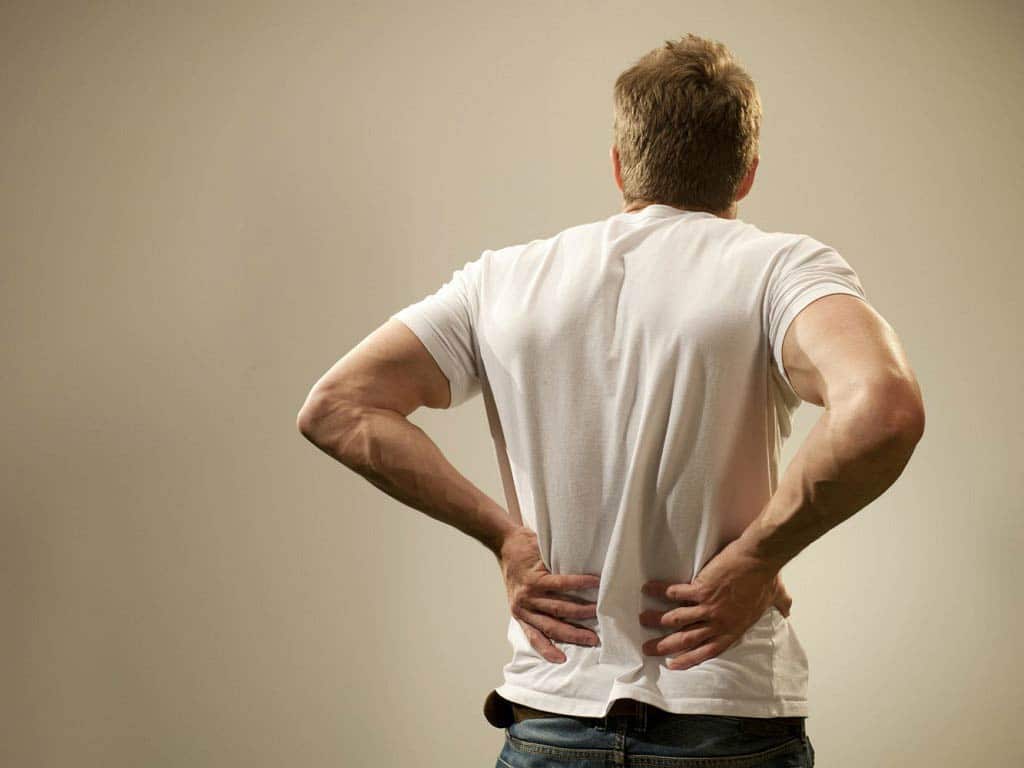 A man experiencing back pain
