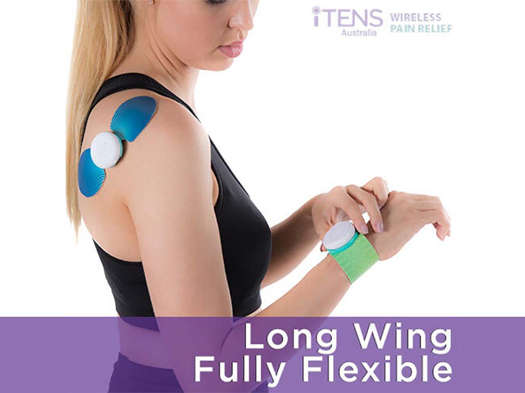 A woman using wireless TENS machines on the shoulder and wrist